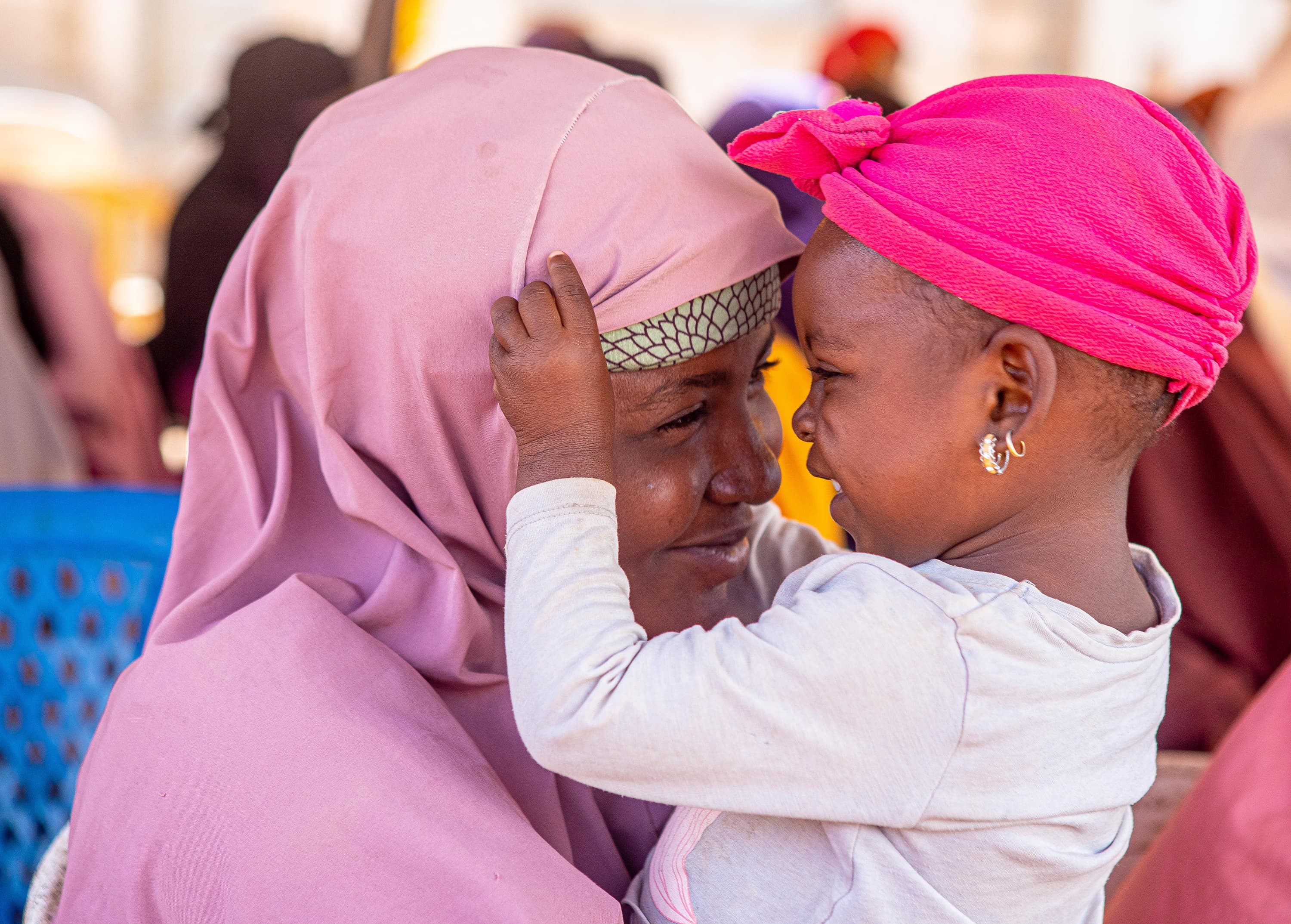 Mamma med barn - glada - Nigeria 2025